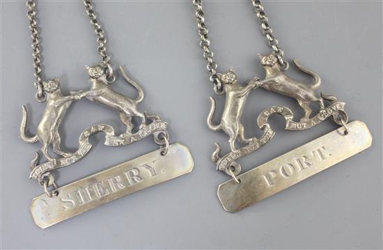 A pair of rare Clan Mackintosh silver Sherry and Port labels, each cast with rampant cats and motto, Edward Thomason,
